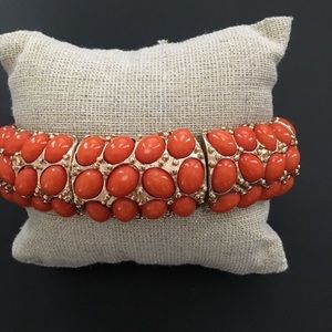 Gold and coral stretch bracelet